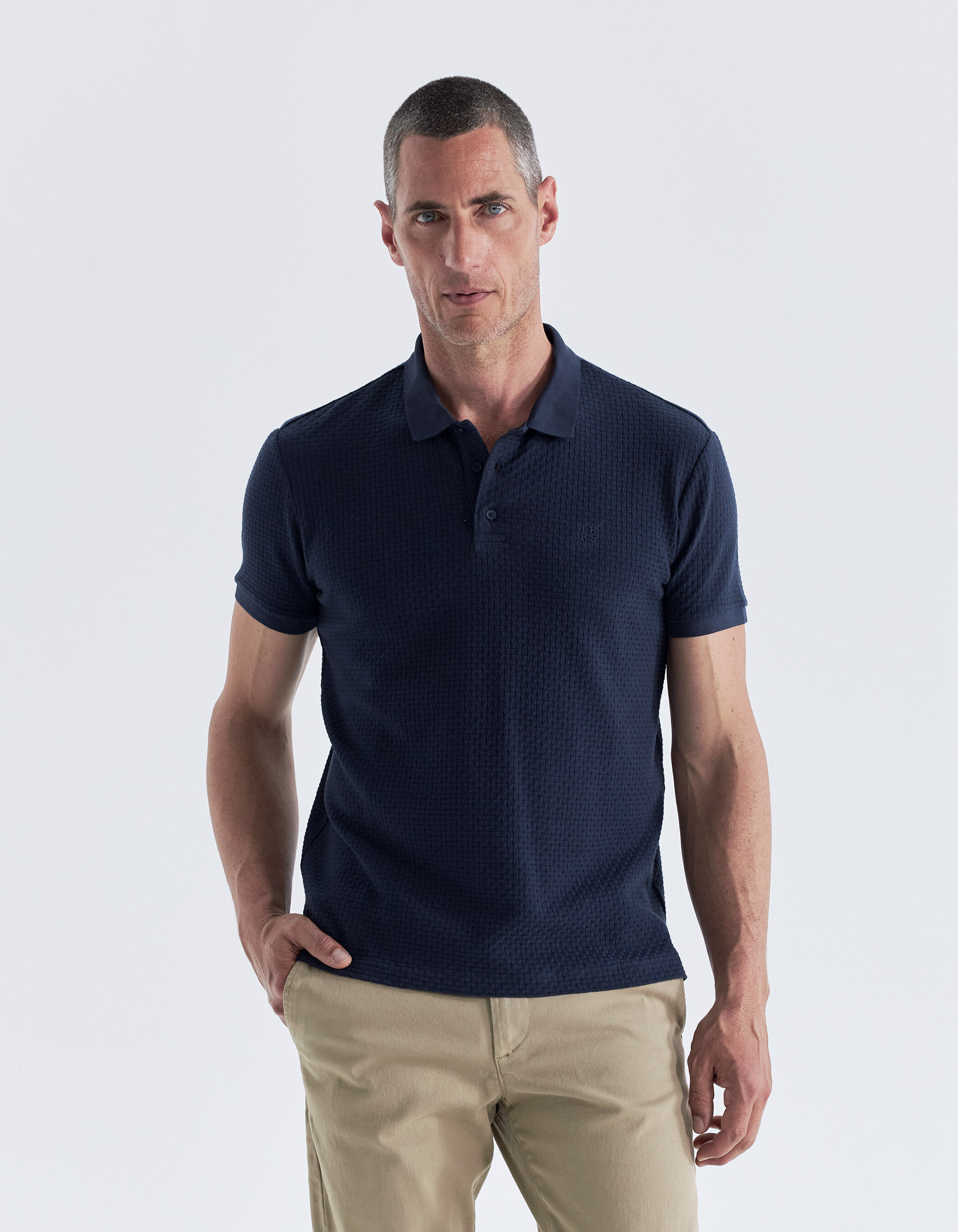 Men s navy polo shirt with woven look texture