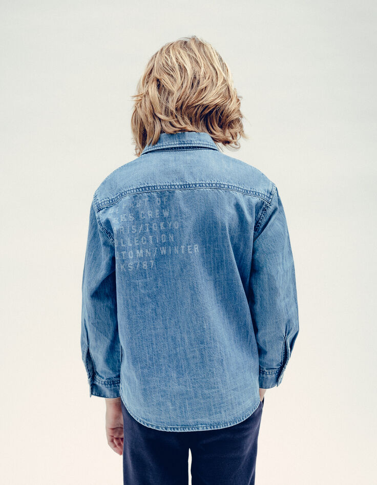 Blauw denim shirt waterloos bericht rug jongen-1