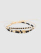 Yellow metal bracelets with black and gold beads for girls-4