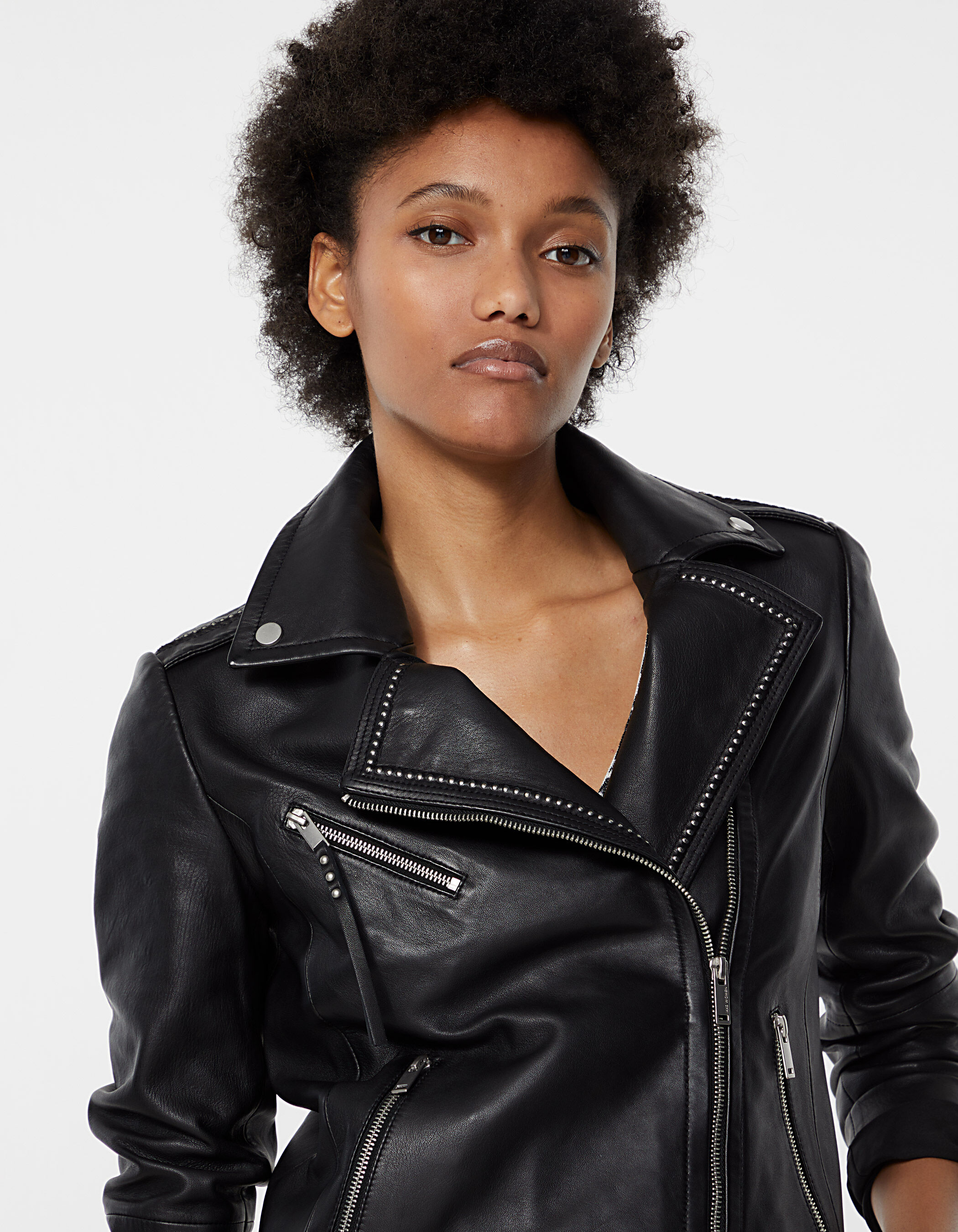 Women's black zipped pocket lambskin leather jacket