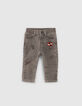 Baby boys’ grey jeans with print and badge-1