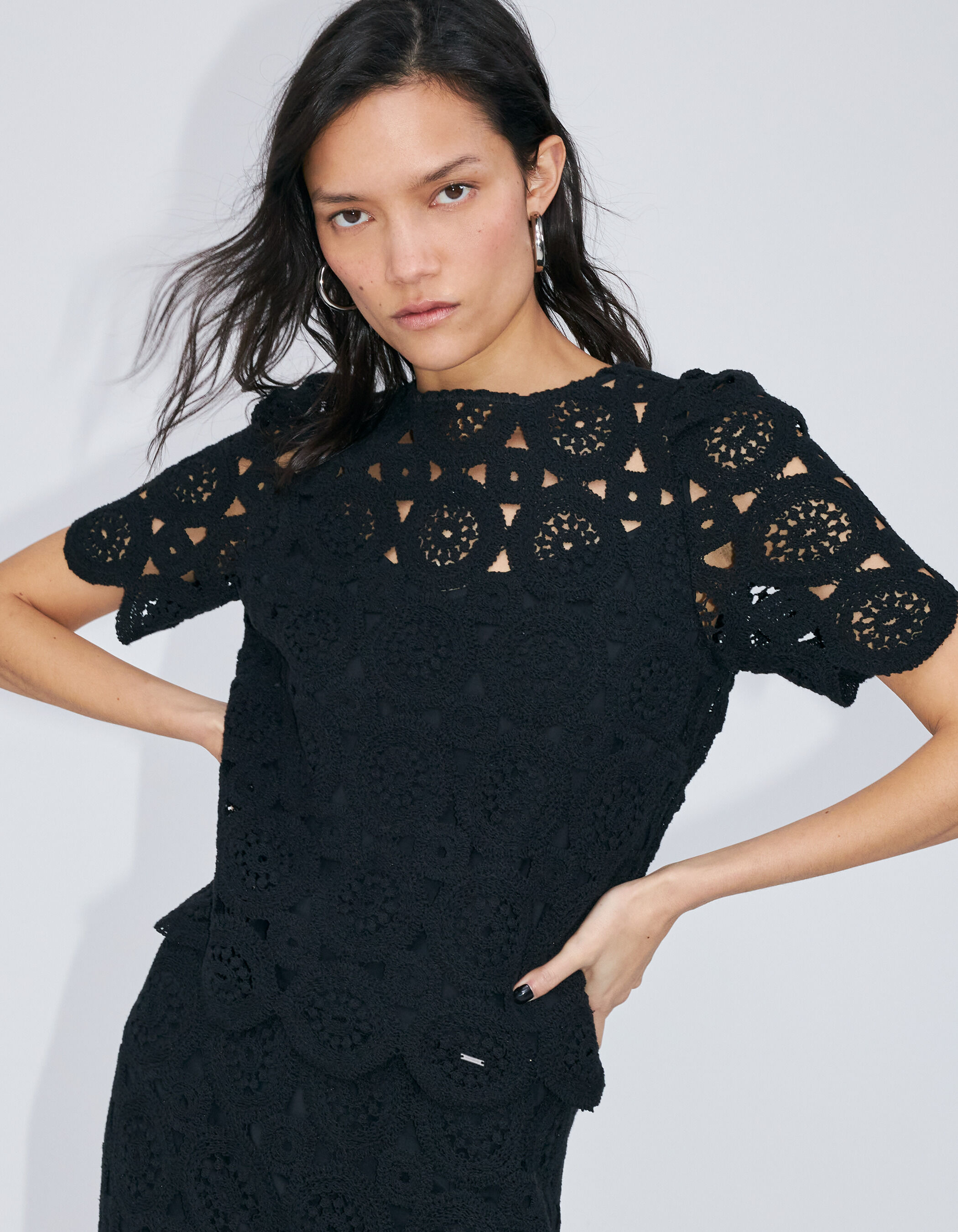 Women's black crochet cropped top