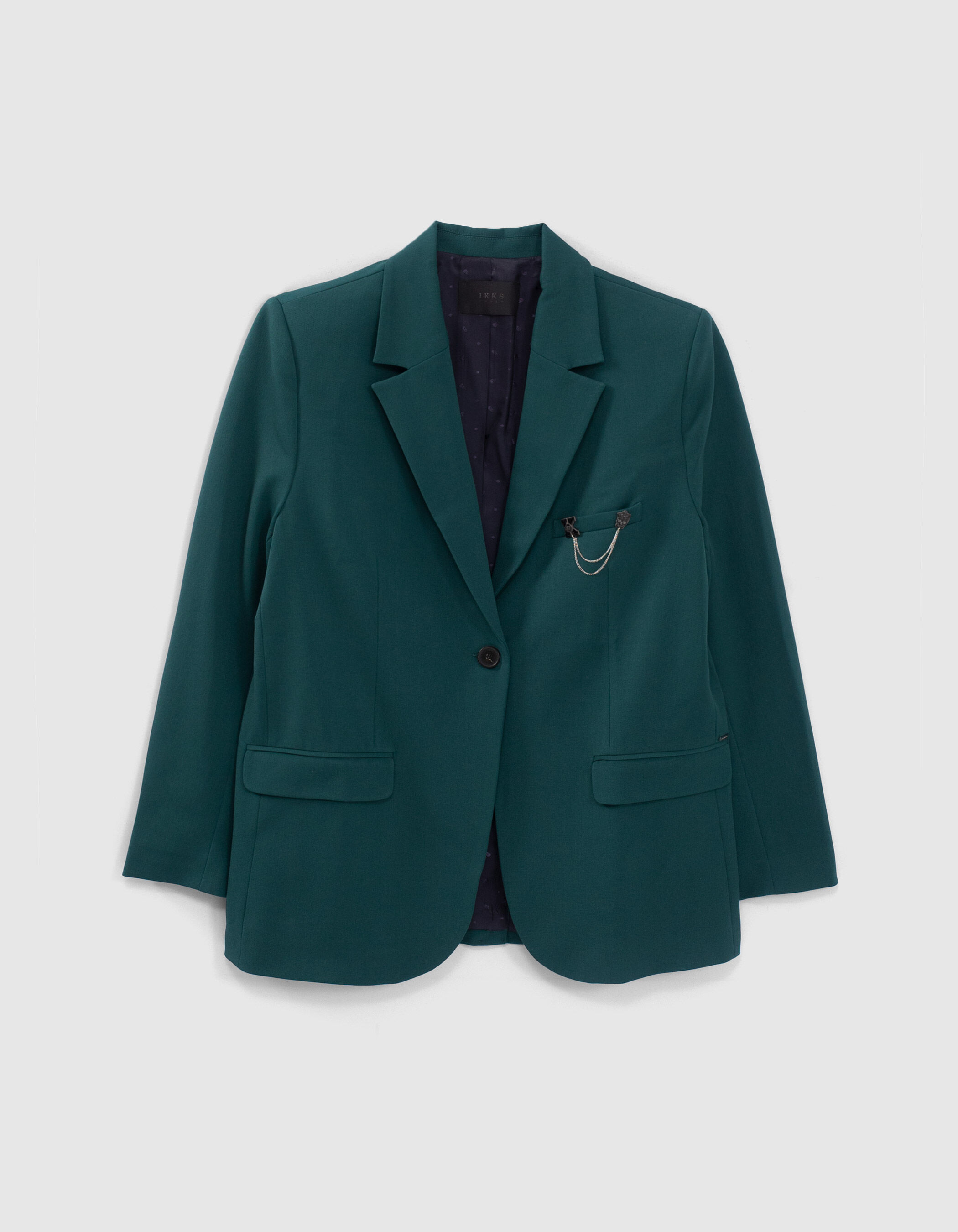 Women's duck green suit jacket with pin badge