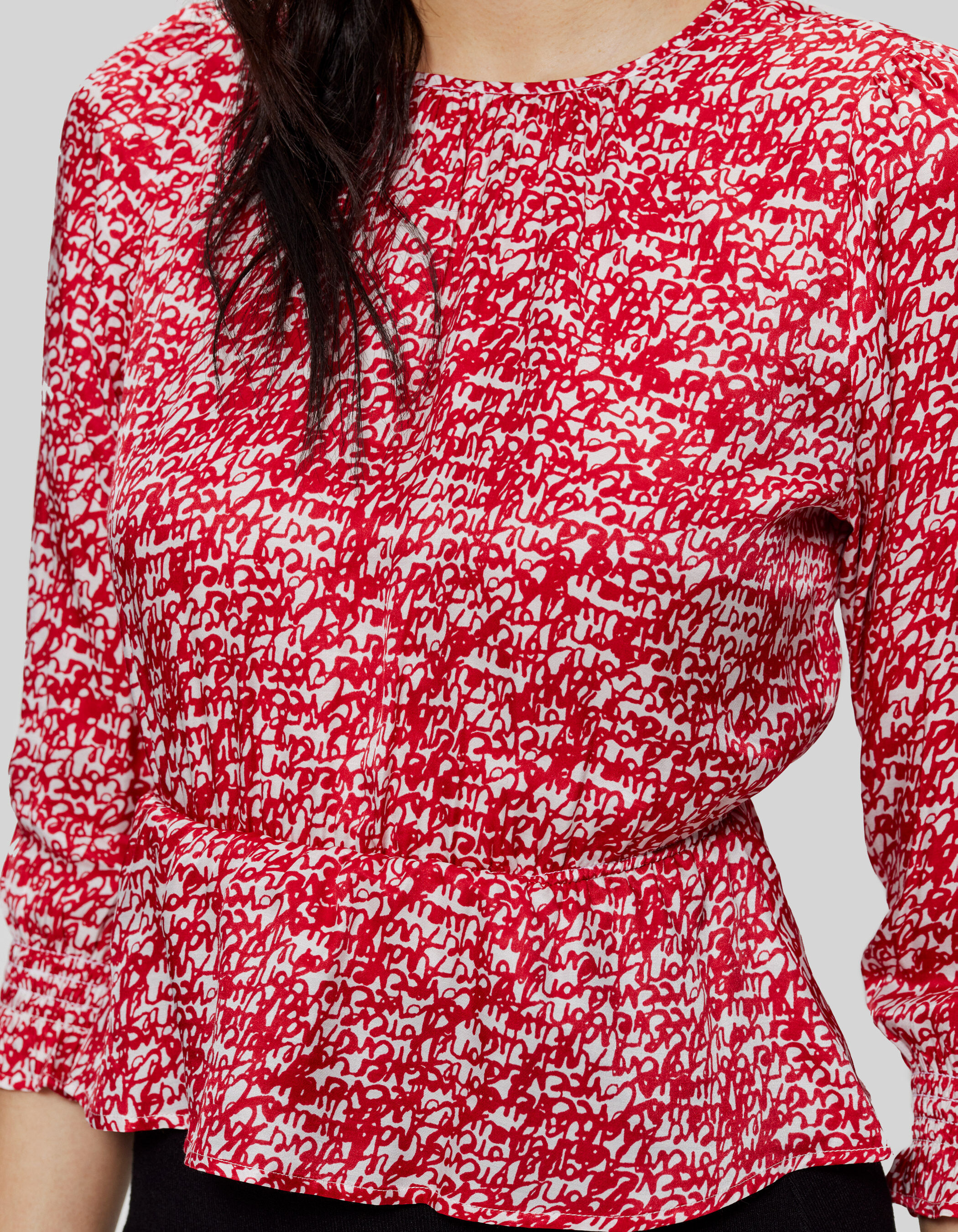 Women's red tag print blouse